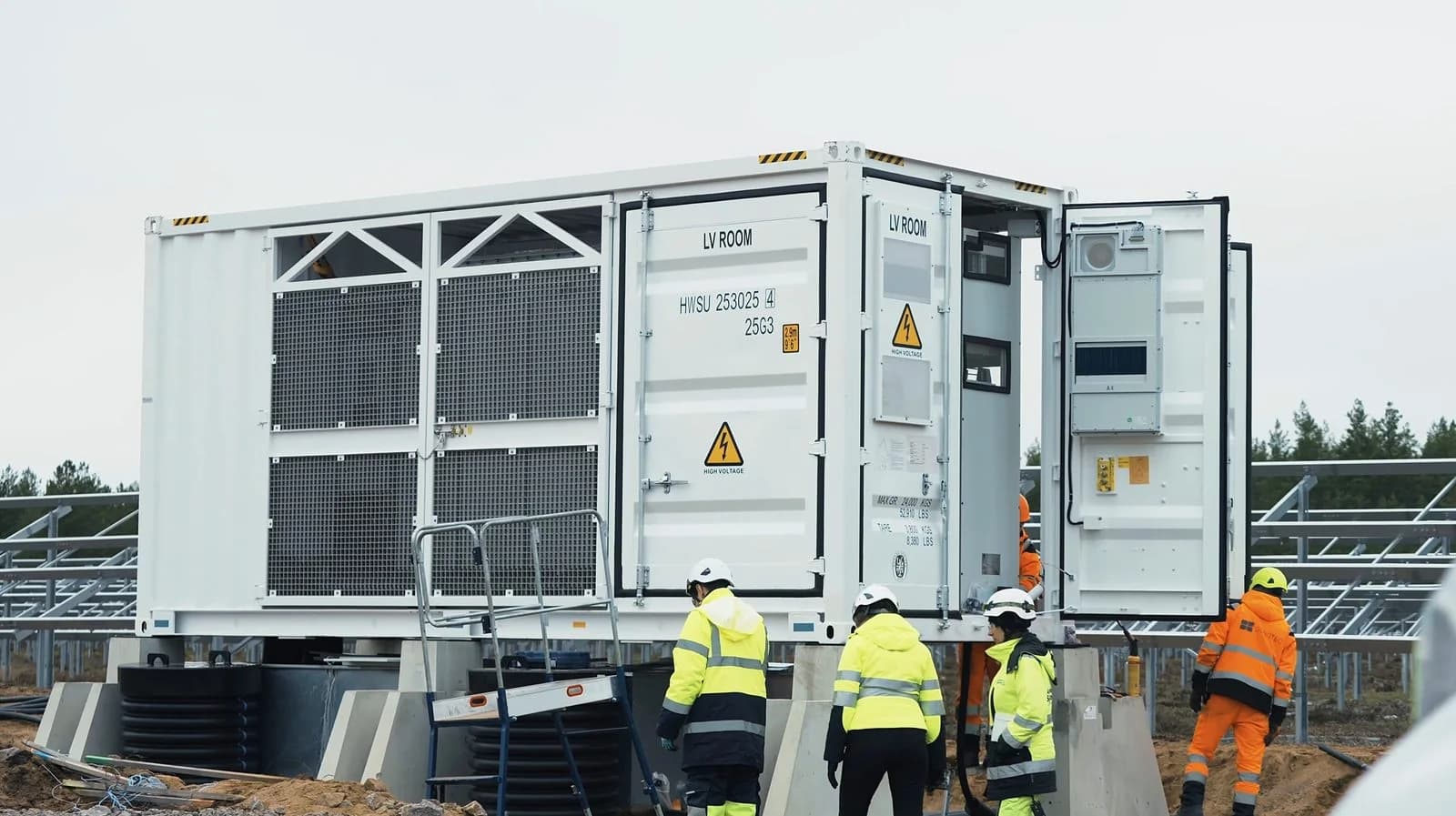Solar panel electrical installation by certified workers on industrial rooftop