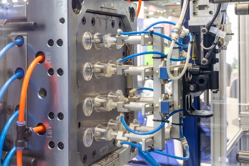 Plastic injection-moulding machine on a production line at a Chinese factory